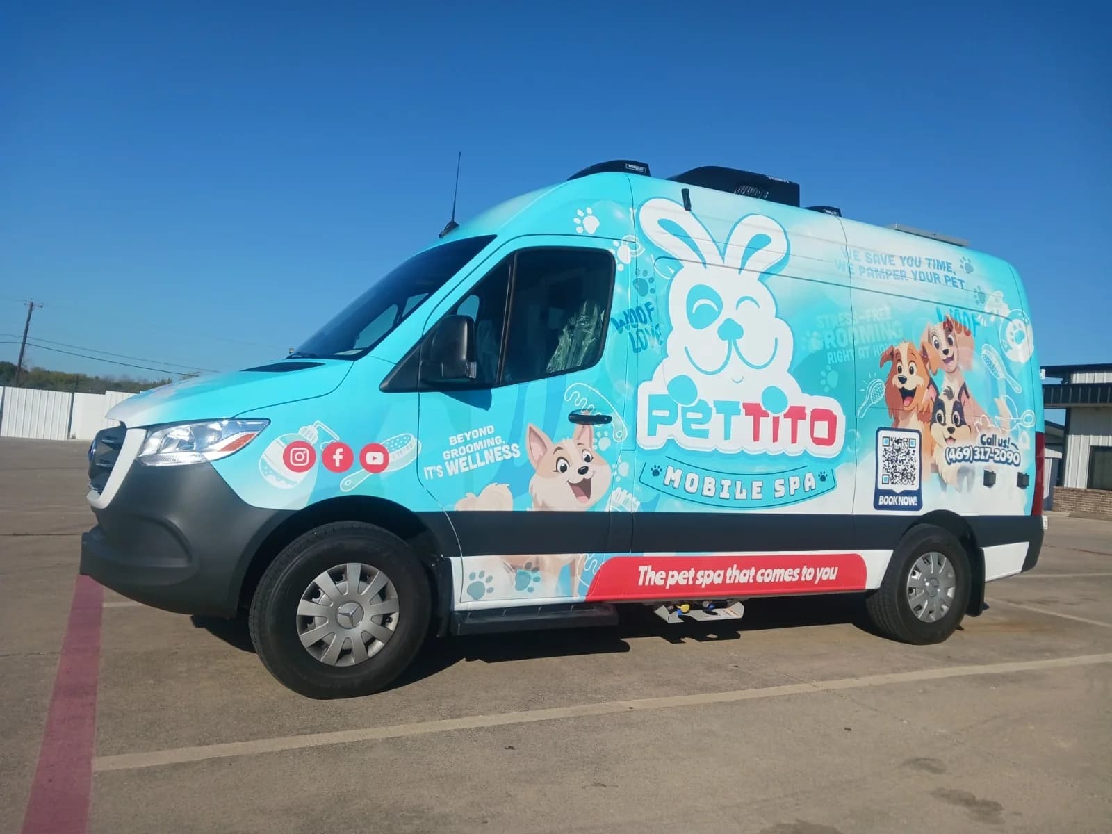 Pettito Mobile Spa grooming van parked in a neighborhood